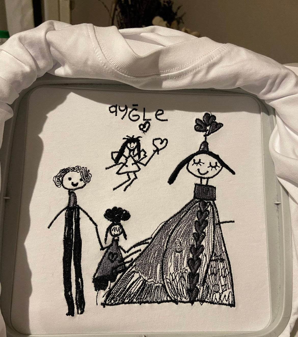 Special handwriting / Art work embroidered on a T-shirt
