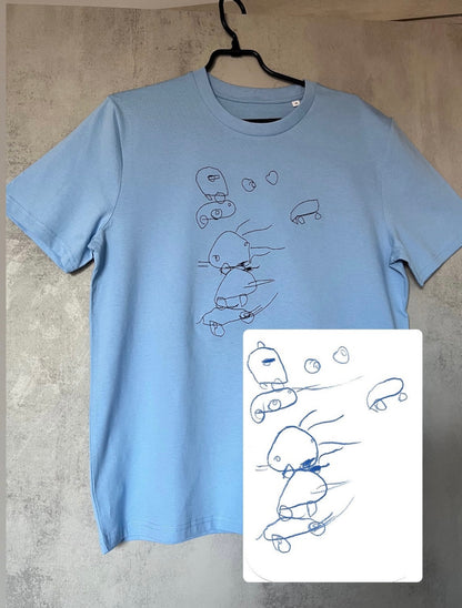 Kids drawing custom embroidery on a T-shirt